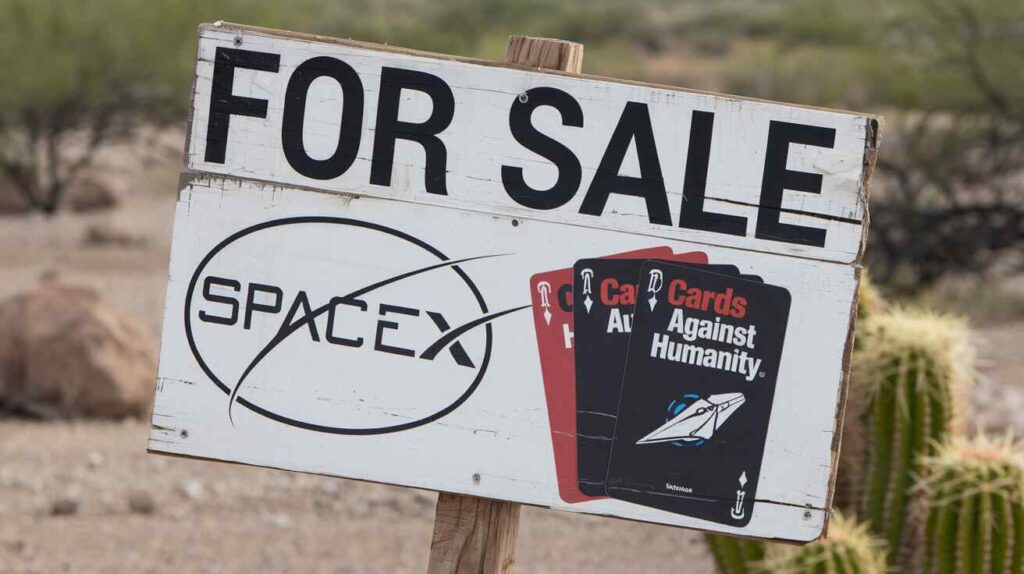 A satirical "For Sale" sign on the disputed land, with both the SpaceX and Cards Against Humanity logos crudely drawn on it