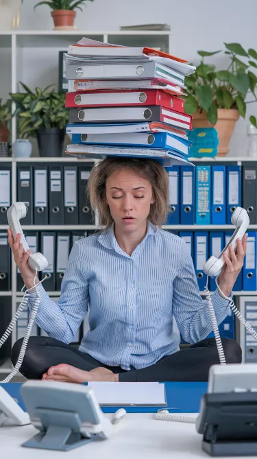 A frazzled social worker attempting to perform yoga while balancing a tower of case files and answering multiple phones with various body parts